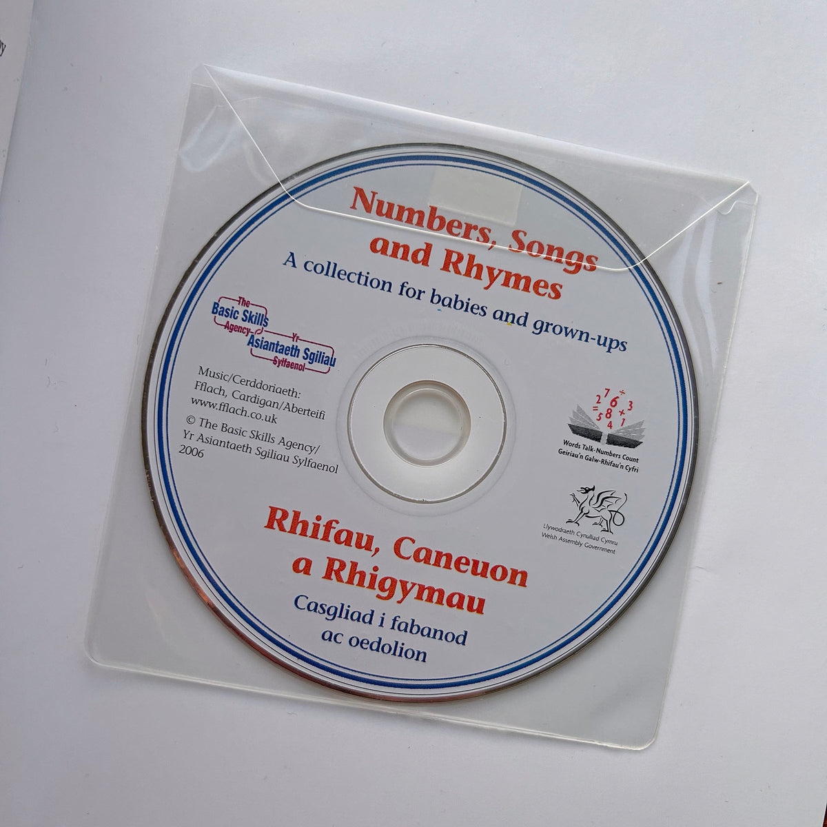 Numbers, Songs and Rhymes / Rhifau Caneuon a Rhigymau + CD (Preloved / Like New)