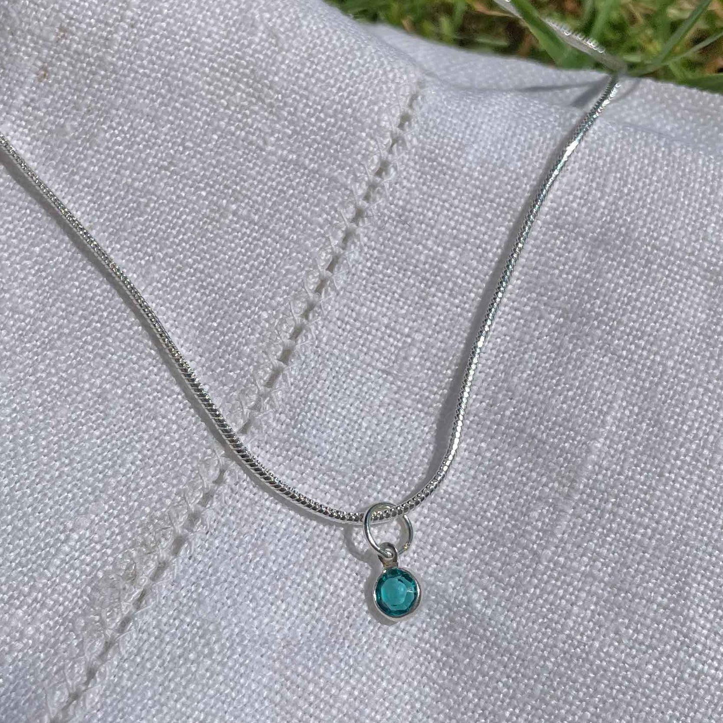 Birthstone Crystal Pendant - Silver Necklace - Welsh Language - December / Blue Zircon