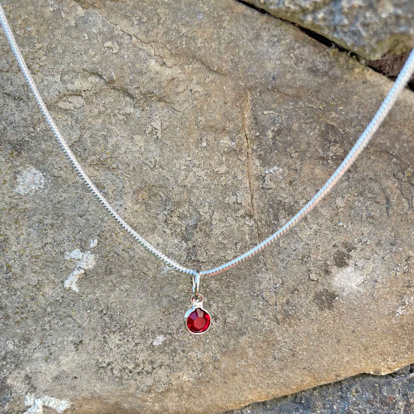 Birthstone Crystal Pendant - Silver Necklace - Welsh Language - January / Garnet
